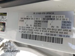 2013 Mazda 5 Touring with VIN JM1CW2CLXD0151396, listed as a IAAI auction lot 40479013 with 118,314 mi miles and . Bid and sale history available at DreamBid. Image 9.