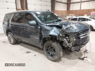2021 Chevrolet Tahoe LT z VIN 1GNSKNKD5MR354265, wystawiony jako IAAI lot #42331890 z przebiegiem 106 250 mil mil oraz . Historia ofert i sprzedaży dostępna na DreamBid. Obrazek 1.