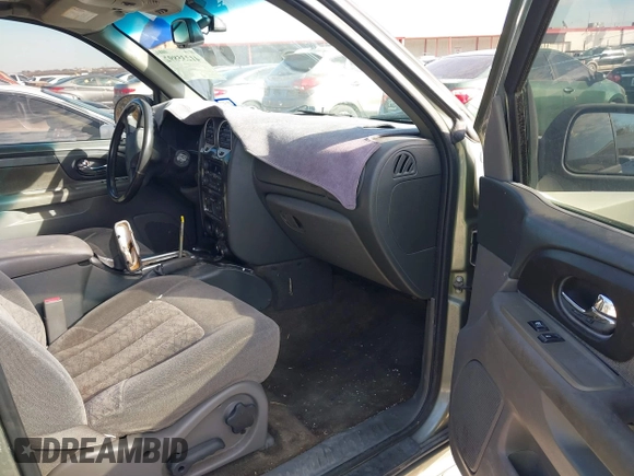 2003 GMC Envoy XL SLE with VIN 1GKES16S436154196, listed as a IAAI auction lot 41235892 with 270,596 mi miles. Bid and sale history available at carsss.com. Image 5.