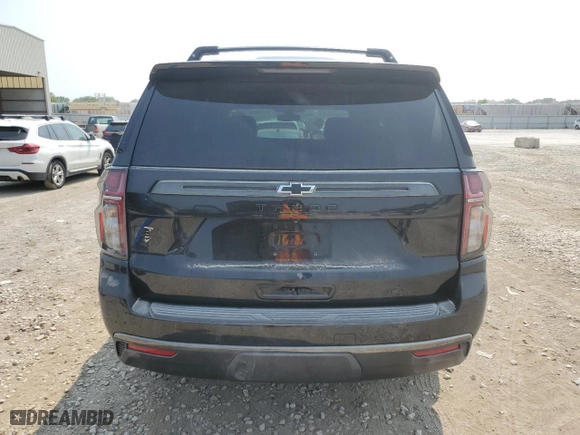 2022 Chevrolet Tahoe Z71 with VIN 1GNSKPKD8NR140433, listed as a Copart auction lot 64792034 with 51,675 mi miles and Salvage Title. Bid and sale history available at carsss.com. Image 6.