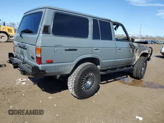 1987 Toyota Land Cruiser z VIN JT3FJ60G4H1135841, wystawiony jako Copart lot #88982685 z przebiegiem Nie podano mil oraz Nie do naprawy • Non repairable. Historia ofert i sprzedaży dostępna na DreamBid. Obrazek 3.