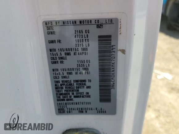 2021 Nissan NV200 S with VIN 3N6CM0KNXMK707399, listed as a Copart auction lot 56585605 with 51,484 mi miles and Salvage title. Bid and sale history available at DreamBid. Image 14.