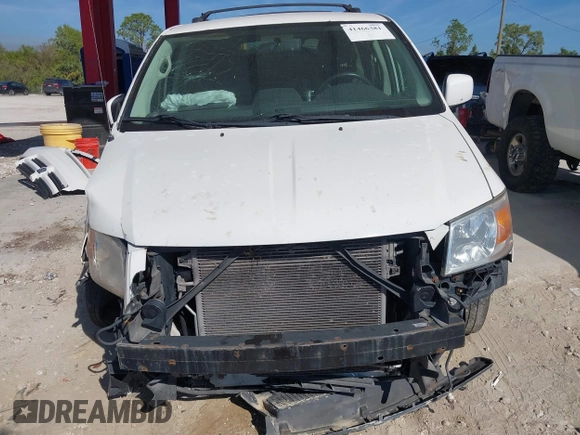 2010 Dodge Grand Caravan SXT with VIN 2D4RN5D1XAR462150, listed as a IAAI auction lot 41466381 with 204,531 mi miles and . Bid and sale history available at DreamBid. Image 6.