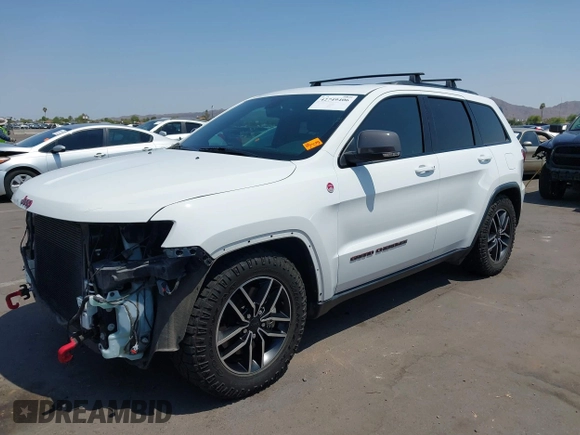 2019 Jeep Grand Cherokee Trailhawk with VIN 1C4RJFLT7KC751143, listed as a IAAI auction lot 42749406 with 54,024 mi miles and . Bid and sale history available at DreamBid. Image 2.