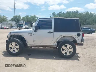 2009 Jeep Wrangler X with VIN 1J4FA24189L755392, listed as a IAAI auction lot 42176130 with 97,644 mi miles and . Bid and sale history available at DreamBid. Image 13.
