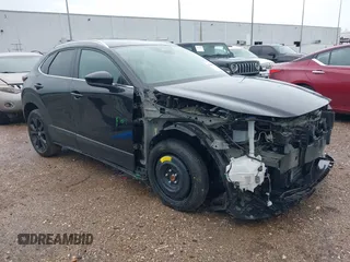 2024 Mazda CX-30 S Select Sport with VIN 3MVDMBBM3RM700797, listed as a IAAI auction lot 42686898 with 23,170 mi miles and . Bid and sale history available at DreamBid. Image 1.
