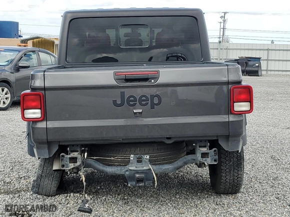 2023 Jeep Gladiator Freedom with VIN 1C6JJTAG9PL557861, listed as a Copart auction lot 50452955 with 44,716 mi miles and Salvage Title. Bid and sale history available at carsss.com. Image 6.