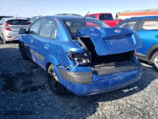2009 Kia Rio SX with VIN KNADE223796508737, listed as a Copart auction lot 50266225 with 196,590 mi miles and Salvage Title. Bid and sale history available at carsss.com. Image 2.