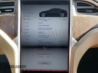 2016 Tesla Model S 90D with VIN 5YJSA1E20GF169954, listed as a Copart auction lot 61974475 with 124,560 mi miles and Salvage title. Bid and sale history available at DreamBid. Image 9.
