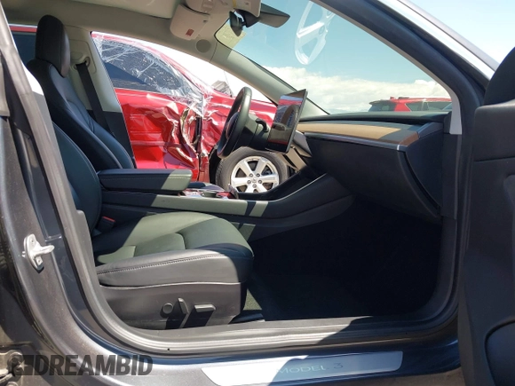 2019 Tesla Model 3 Long Range with VIN 5YJ3E1EB9KF386047, listed as a IAAI auction lot 42215362 with 41,246 mi miles and . Bid and sale history available at DreamBid. Image 5.
