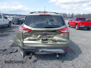 2013 Ford Escape SE с VIN 1FMCU9GXXDUC09846, выставлен на аукционе IAAI как лот 41925442 с пробегом 124 597 миль миль и . История ставок и продаж доступна на DreamBid. Изображение 16.