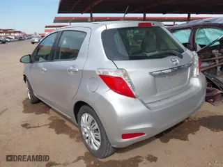 2014 Toyota Yaris L with VIN JTDKTUD34ED574709, listed as a IAAI auction lot 41607903 with 133,481 mi miles. Bid and sale history available at carsss.com. Image 3.