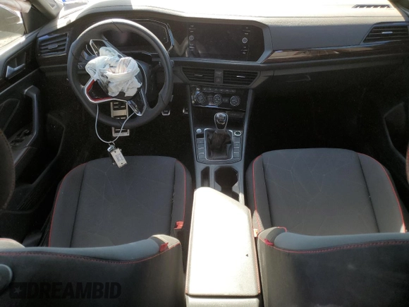 2024 Volkswagen Jetta 40th Anniversary Edition with VIN 3VW8T7BU0RM068373, listed as a Copart auction lot 77764614 with 12,128 mi miles and Salvage title. Bid and sale history available at DreamBid. Image 8.