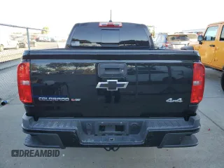 2019 Chevrolet Colorado 2WD Z71 with VIN 1GCGSDEN1K1314774, listed as a Copart auction lot 77212044 with 74,689 mi miles and Salvage Title. Bid and sale history available at carsss.com. Image 6.