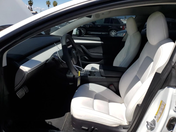 2022 Tesla Model 3 Performance with VIN 5YJ3E1EC7NF248083, listed as a Copart auction lot 51536925 with 50,529 mi miles and Salvage Title. Bid and sale history available at DreamBid. Image 7.