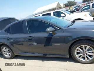 2025 Toyota Camry LE with VIN 4T1DAACK5SU008796, listed as a IAAI auction lot 41978714 with 20,225 mi miles and . Bid and sale history available at DreamBid. Image 14.
