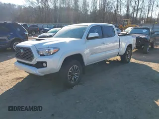2021 Toyota Tacoma 4WD SR5 with VIN 3TYDZ5BN3MT001860, listed as a IAAI auction lot 41269423 with 23,378 mi miles. Bid and sale history available at carsss.com. Image 17.
