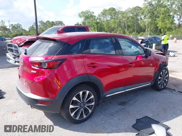 2019 Mazda CX-3 Grand Touring with VIN JM1DKFD70K0431771, listed as a IAAI auction lot 41589257 with 90,119 mi miles. Bid and sale history available at carsss.com. Image 4.