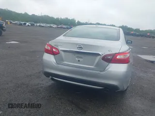 2017 Nissan Altima SV with VIN 1N4AL3AP4HC148936, listed as a IAAI auction lot 42340153 with 76,049 mi miles and . Bid and sale history available at DreamBid. Image 16.