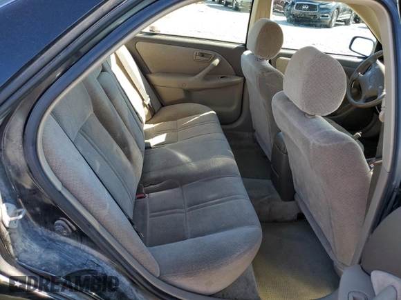 2000 Toyota Camry CE z VIN 4T1BG22K0YU699662, wystawiony jako Copart lot #47949165 z przebiegiem 270 179 mil mil oraz Szkoda całkowita • Salvage title. Historia ofert i sprzedaży dostępna na DreamBid. Obrazek 10.