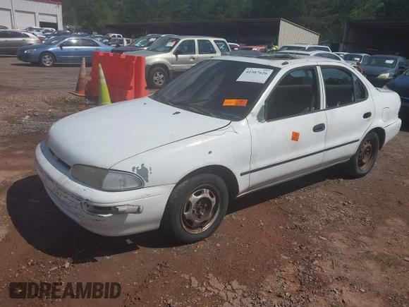 1996 Geo Prizm LSi z VIN 1Y1SK5265TZ048378, wystawiony jako IAAI lot #41987626 z przebiegiem 191 228 mil mil oraz . Historia ofert i sprzedaży dostępna na DreamBid. Obrazek 2.