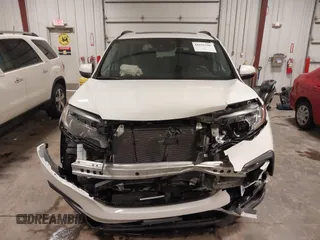 2022 Honda Pilot Special Edition with VIN 5FNYF6H27NB105041, listed as a IAAI auction lot 41916708 with 15,848 mi miles and . Bid and sale history available at DreamBid. Image 13.
