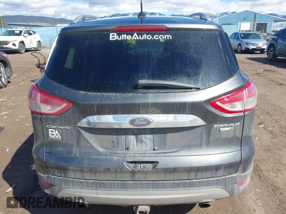 2016 Ford Escape Titanium with VIN 1FMCU9J96GUB96009, listed as a IAAI auction lot 41866127 with 132,990 mi miles and . Bid and sale history available at DreamBid. Image 17.