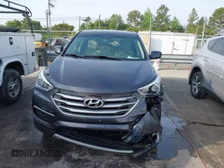 2018 Hyundai Santa Fe 2.4L with VIN 5XYZT3LB0JG525150, listed as a IAAI auction lot 42070377 with 142,418 mi miles and . Bid and sale history available at DreamBid. Image 12.