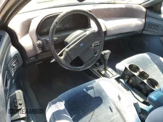 1989 Ford Probe z VIN 1ZVBT21C9K5202343, wystawiony jako Copart lot #55885985 z przebiegiem 150 457 mil mil oraz Czysty tytuł • Clean title. Historia ofert i sprzedaży dostępna na DreamBid. Obrazek 8.