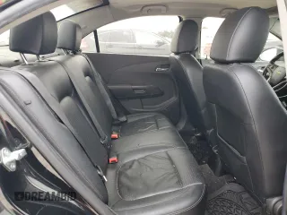 2012 Chevrolet Sonic LTZ z VIN 1G1JE5SB2C4173638, wystawiony jako Copart lot #84634474 z przebiegiem 148 247 mil mil oraz Szkoda całkowita • Salvage title. Historia ofert i sprzedaży dostępna na DreamBid. Obrazek 10.
