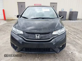 2015 Honda Fit EX-L z VIN 3HGGK5H8XFM733048, wystawiony jako IAAI lot #42267517 z przebiegiem Nie podano mil oraz . Historia ofert i sprzedaży dostępna na DreamBid. Obrazek 6.