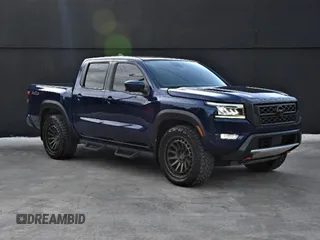 2022 Nissan Frontier Pro-4X с VIN 1N6ED1EK1NN621457, выставлен на аукционе Copart как лот 67222615 с пробегом 24 133 миль миль и Чистый • Clean title. История ставок и продаж доступна на DreamBid. Изображение 1.