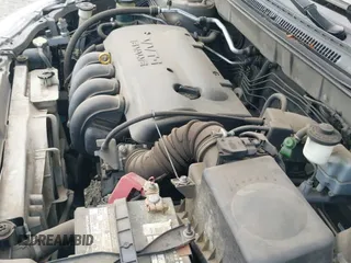 2004 Toyota Corolla CE z VIN 1NXBR38E14Z295801, wystawiony jako IAAI lot #43185740 z przebiegiem 114 951 mil mil oraz . Historia ofert i sprzedaży dostępna na DreamBid. Obrazek 19.