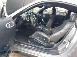 2003 Nissan 350Z Touring z VIN JN1AZ34E33T003711, wystawiony jako IAAI lot #41351191 z przebiegiem 167 503 mil mil oraz . Historia ofert i sprzedaży dostępna na DreamBid. Obrazek 5.