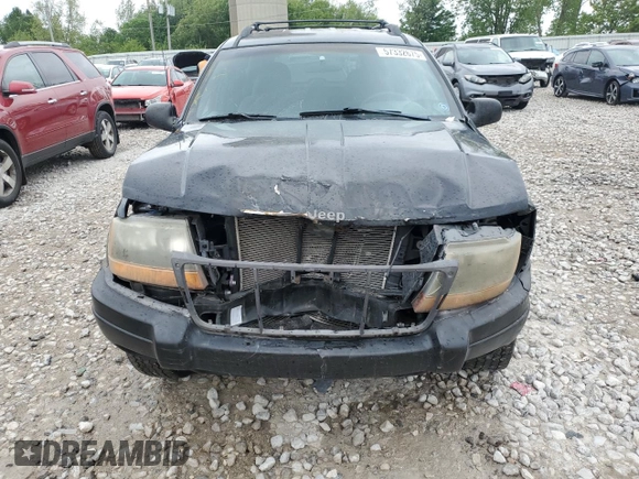 2000 Jeep Grand Cherokee Laredo z VIN 1J4GW48S1YC326453, wystawiony jako Copart lot #57332675 z przebiegiem 290 059 mil mil oraz Czysty tytuł • Clean title. Historia ofert i sprzedaży dostępna na DreamBid. Obrazek 5.
