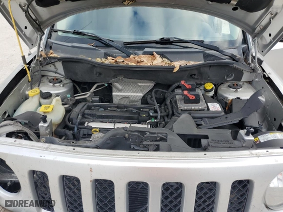 2011 Jeep Patriot Latitude with VIN 1J4NT1GA2BD252372, listed as a Copart auction lot 80928994 with 140,376 mi miles and Salvage Title. Bid and sale history available at carsss.com. Image 14.
