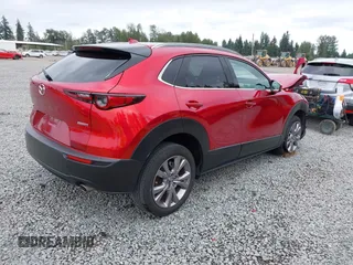 2021 Mazda CX-30 Premium with VIN 3MVDMBDM7MM213754, listed as a IAAI auction lot 42509691 with 61,230 mi miles and . Bid and sale history available at DreamBid. Image 4.