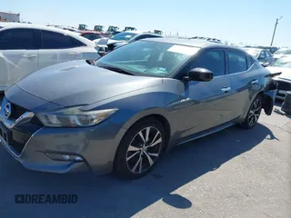 2016 Nissan Maxima SR with VIN 1N4AA6AP9GC414943, listed as a IAAI auction lot 41976295 with 154,738 mi miles and . Bid and sale history available at DreamBid. Image 2.
