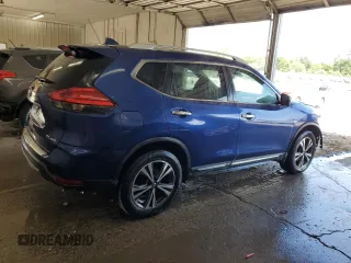 2017 Nissan Rogue SV with VIN 5N1AT2MV2HC878595, listed as a Copart auction lot 65213435 with 124,034 mi miles and Salvage title. Bid and sale history available at DreamBid. Image 3.