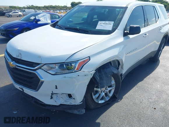 2021 Chevrolet Traverse LS with VIN 1GNERFKW0MJ240592, listed as a IAAI auction lot 42310680 with 59,986 mi miles and . Bid and sale history available at DreamBid. Image 6.