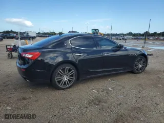 2015 Maserati Ghibli with VIN ZAM57XSA2F1129792, listed as a Copart auction lot 70717393 with 116,851 mi miles. Bid and sale history available at carsss.com. Image 3.