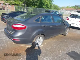 2016 Ford Fiesta SE z VIN 3FADP4BJ8GM184675, wystawiony jako IAAI lot #42169234 z przebiegiem 54 231 mil mil oraz . Historia ofert i sprzedaży dostępna na DreamBid. Obrazek 4.