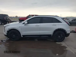 2024 Cadillac XT4 FWD Sport with VIN 1GYFZER42RF246488, listed as a IAAI auction lot 42029551 with 6,476 mi miles and . Bid and sale history available at DreamBid. Image 15.