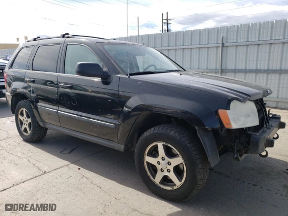 2007 Jeep Grand Cherokee Laredo with VIN 1J8HR48P67C698021, listed as a Copart auction lot 50022895 with 176,120 mi miles and Salvage Title. Bid and sale history available at carsss.com. Image 4.
