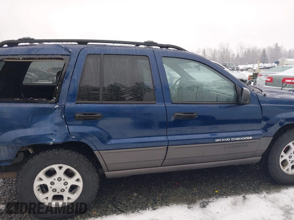 2001 Jeep Grand Cherokee Laredo with VIN 1J4GW48N21C730703, listed as a IAAI auction lot 41581667 with 111,054 mi miles and . Bid and sale history available at DreamBid. Image 14.