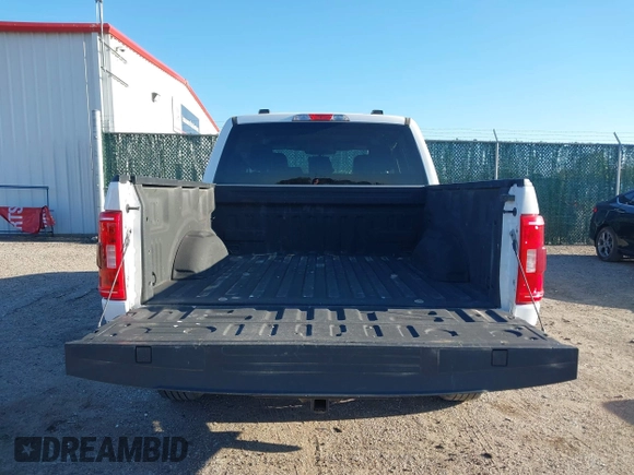 2021 Ford F-150 XL with VIN 1FTEW1EP5MKE25613, listed as a IAAI auction lot 42028237 with 116,341 mi miles. Bid and sale history available at carsss.com. Image 16.