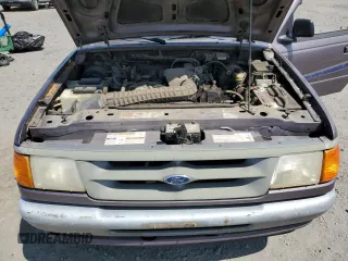 1995 Ford Ranger XLT z VIN 1FTCR10X0SPA73451, wystawiony jako Copart lot #60576195 z przebiegiem 140 064 mil mil oraz Czysty tytuł • Clean title. Historia ofert i sprzedaży dostępna na DreamBid. Obrazek 11.