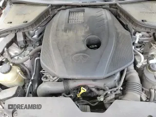2017 Infiniti Q50 Premium z VIN JN1CV7ARXHM682543, wystawiony jako Copart lot #61445155 z przebiegiem 100 635 mil mil oraz Szkoda całkowita • Salvage title. Historia ofert i sprzedaży dostępna na DreamBid. Obrazek 13.