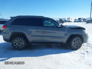 2021 Jeep Grand Cherokee Trailhawk with VIN 1C4RJFLG2MC854007, listed as a IAAI auction lot 41512394 with 50,674 mi miles. Bid and sale history available at carsss.com. Image 14.