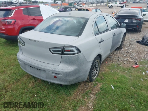 2013 Mitsubishi Lancer ES with VIN JA32U2FUXDU006887, listed as a IAAI auction lot 42619092 with 154,715 mi miles and . Bid and sale history available at DreamBid. Image 4.